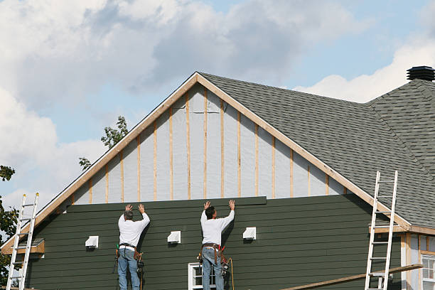 Professional Storm Damage Siding Repair technician working in Petersburg, VA